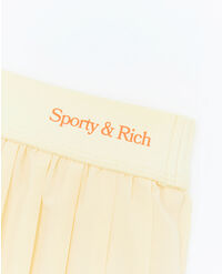 SPORTY & RICH NEW SERIF PLEATED SKIRT
